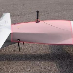 Oil electric hybrid tandem wing vertical takeoff and landing unmanned aerial vehicle